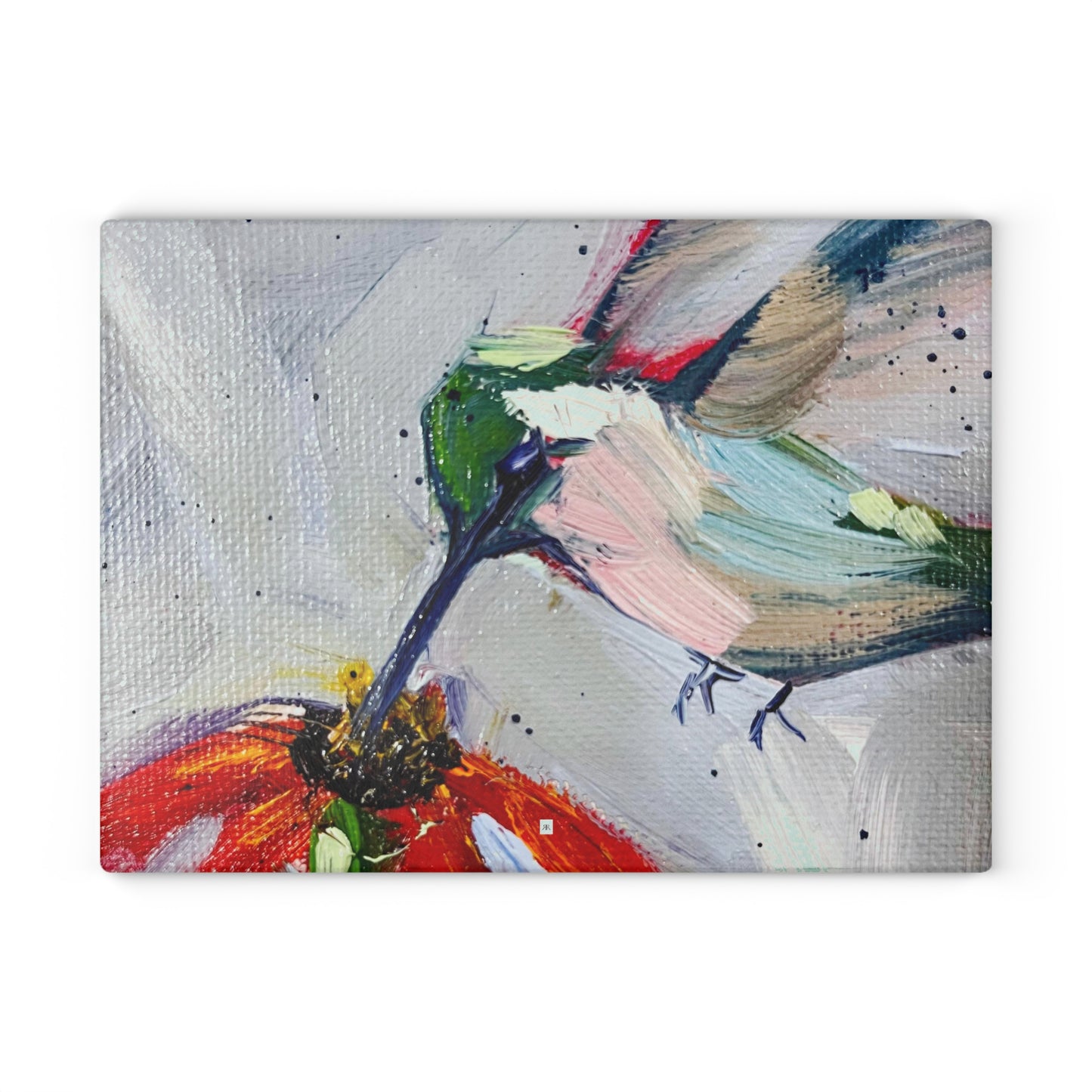 Colibri sur une planche à découper en échinacée