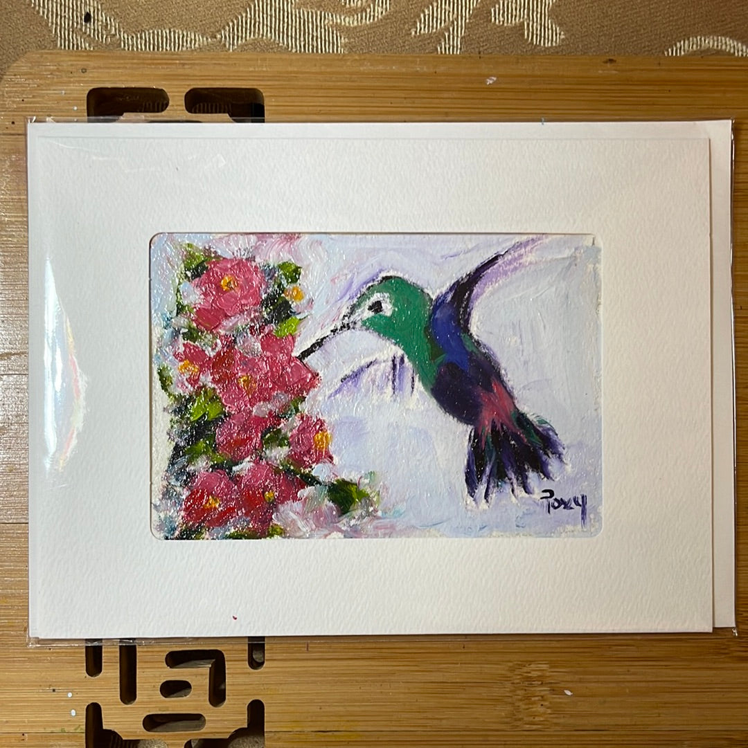 Hummingbird in Pink Flowers