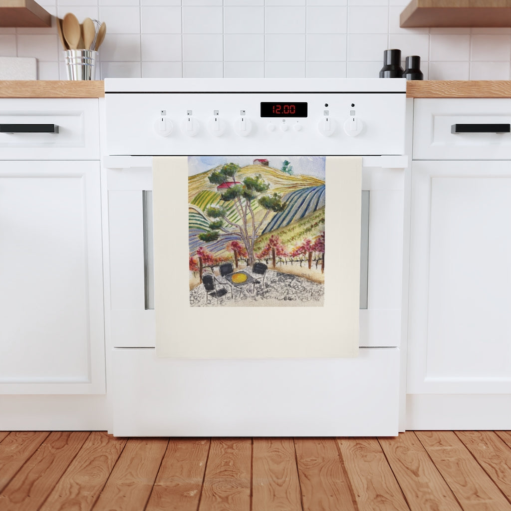 Paño de cocina de algodón orgánico vegano. Pintura original del paisaje vinícola impresa en él.