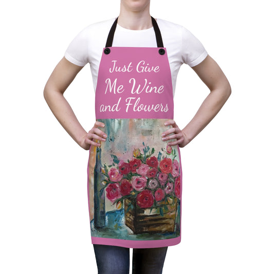 Sólo dame vino y flores en un delantal de cocina rosa